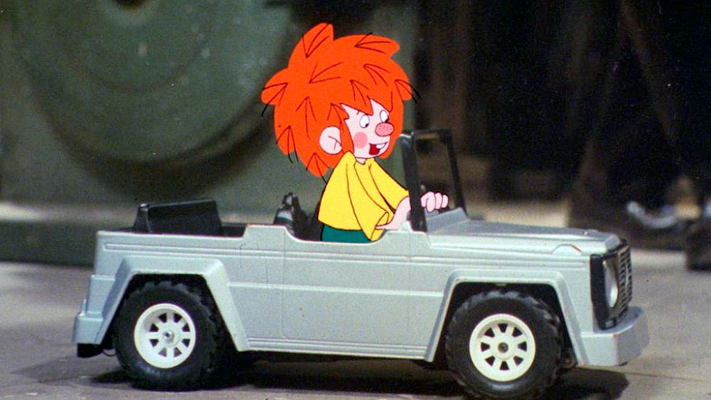 Pumuckl, Semáforo, Múnich, Movilidad urbana, Cultura alemana, Literatura infantil, Personajes icónicos, Seguridad vial, Turismo en Múnich, Homenajes urbanos