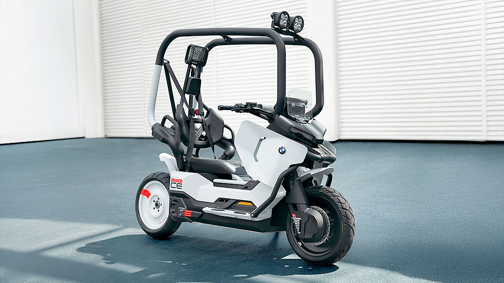 BMW, Vision CE, IAA Mobility 2025, Movilidad urbana eléctrica, scooter eléctrico BMW, moto sin casco, BMW C1 2025, BMW Motorrad, IAA Mobility 2025, jaula de seguridad moto, autoequilibrio scooter, movilidad urbana eléctrica, scooter premium Alemania
