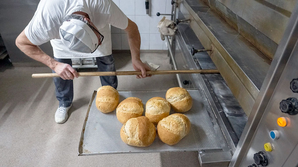 panadería, Suiza, oficio, crisis del pan artesanal, masas congeladas importadas, tradición panadera suiza, Asociación Suiza de Panaderos y Confiteros, pan artesanal vs industrial, cultura gastronómica de Suiza