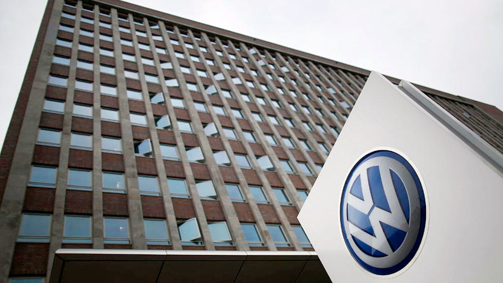 Porsche, Grupo Volkswagen, industria automotriz, estrategia electrificación Porsche, Grupo Volkswagen pérdidas operativas, automóviles eléctricos transición Porsche, aranceles EE.UU. industria automotriz Alemania, Porsche Macan eléctrico ventas, industria automotriz alemana crisis, Porsche volvía al motor de combustión, VW reestructuración empleo Alemania