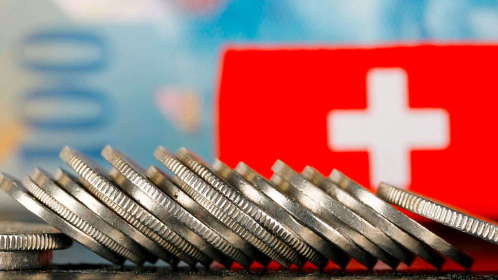 economía suiza, inflación, Banco Nacional Suizo, deflación Suiza, franco suizo, tasa de interés Suiza, economía suiza 2025, política monetaria Suiza, exportaciones suizas, riesgos financieros Suiza, estabilidad económica global