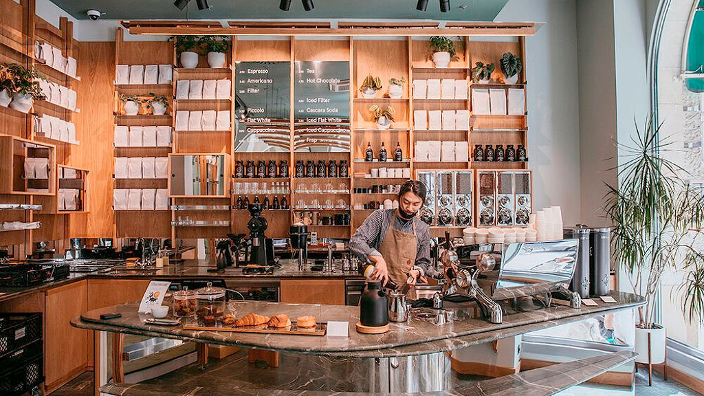 LAP Coffee, Berlín, Ralph Hage, Tonalli Arreola, gentrificación, sector cafetero, guerra del café Alemania, start-up café barato, cafeterías tradicionales Alemania, capuchino 2,50 euros, conflicto sector cafetero, ataques LAP Coffee, competencia café Berlín