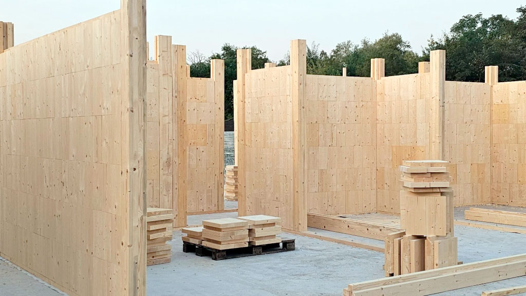 NiTO Holzstein, Construcción sostenible, Alemania, Arquitectura modular, Viviendas de madera, Innovación alemana, Tecnología constructiva, cómo construir una casa en siete días, sistema alemán de construcción en madera, viviendas modulares de madera maciza, construcción sin cemento ni tornillos, tecnología alemana para construir casas