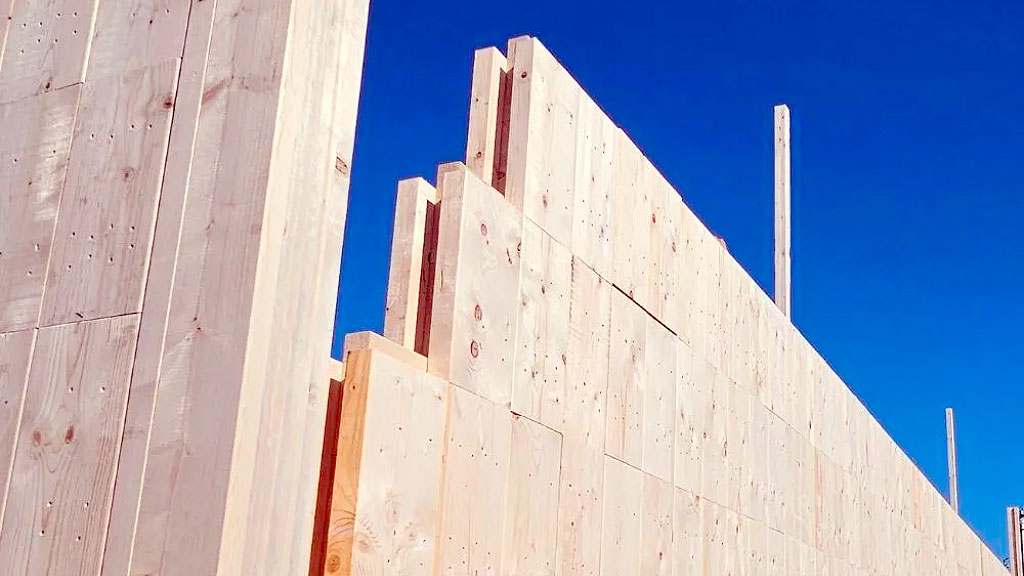 NiTO Holzstein, Construcción sostenible, Alemania, Arquitectura modular, Viviendas de madera, Innovación alemana, Tecnología constructiva, cómo construir una casa en siete días, sistema alemán de construcción en madera, viviendas modulares de madera maciza, construcción sin cemento ni tornillos, tecnología alemana para construir casas