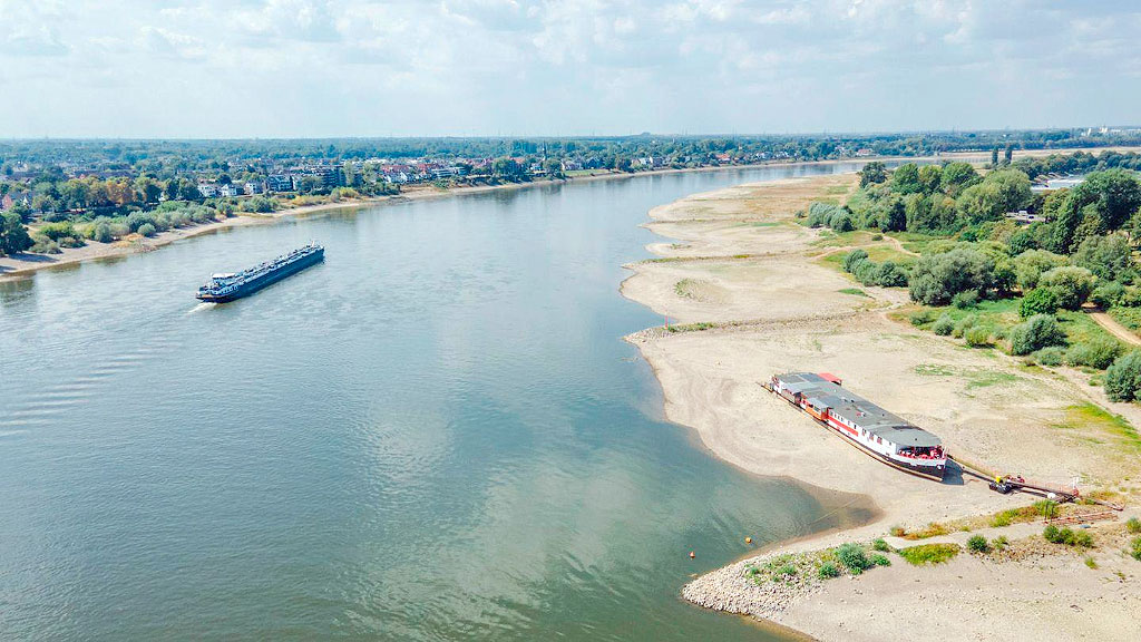 río Rin, mayor economía de Europa, industria alemana, Bajante del Rin, Alemania, Economía alemana, Industria alemana, Transporte fluvial, Kaub, Navegación fluvial, Rhein, Steffen Bilger, Institut der deutschen Wirtschaft, IW, IfW Kiel, Cambio climático, Transporte de combustibles, Logística, Crecimiento económico Alemania, ThyssenKrupp, Rin, Comercio europeo, por qué la bajante del Rin afecta la economía alemana, impacto económico de la bajante del Rin, navegación en el río Rin, nivel del río Rin en Kaub